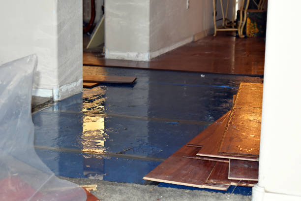 Professional Storm Water Damage Restoration technician working in Pascoag, RI